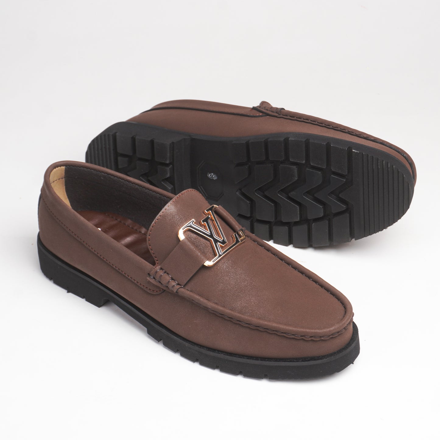 Elegant Brown Sweat loafers with a bold gold-tone "LV" logo & Chunky Sole